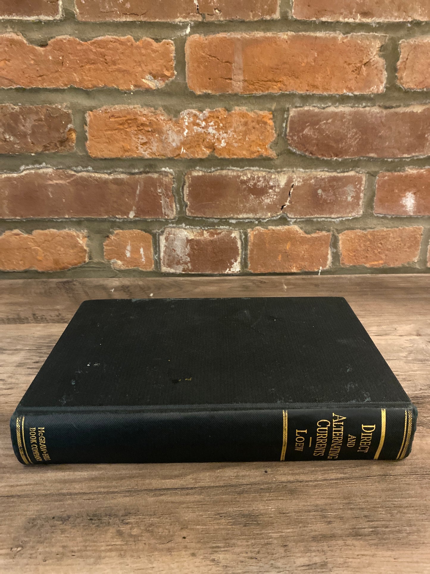 Direct and Alternating Currents by E. A. Loew